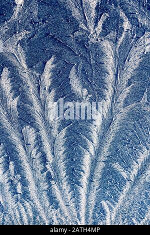 Natural ice crystal formation on window Stock Photo