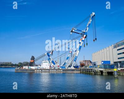 The floating sheerlegs, Matador, Matador 2 and Matador 3 at their home base in the harbour of Rotterdam. Stock Photo
