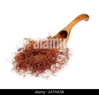 Dry corn flowers on the wooden spoon. Stock Photo