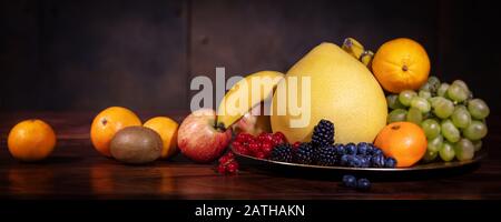 Panorama, Fruit bowl of fresh raw organic sorts on wooden table, copyspace Stock Photo