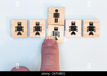Concept Automation in the industry destroys jobs, people have to give way to progress, concept unemployment Stock Photo