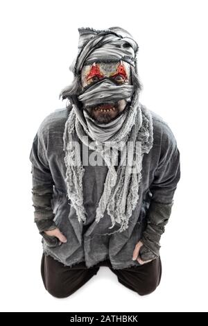 Spooky halloween costume with ugly teeth and bloody eyes, isolated on white Stock Photo
