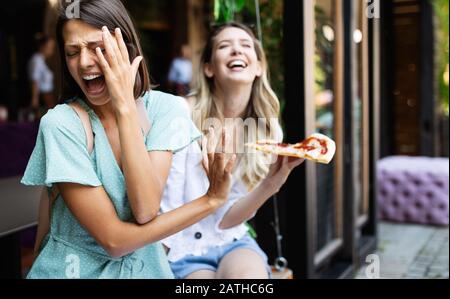 Woman rejecting unhealthy fast food because of gluten intolerance Stock Photo