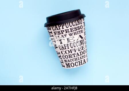 Coffee cup reusable made from plants on a green background Stock Photo