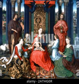 Triptych of St John the Baptist and St John the Evangelist, 1479. Located in the collection at, Hospital Saint Jean, Bruges. Stock Photo