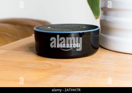 Amazon Alexa Echo Dot smart device powered by Artificial Intelligence (AI) Stock Photo