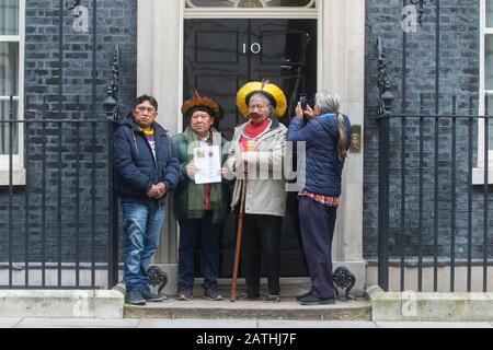 London, UK. 3rd February 2020. Amazon Indigenous leaders L-R Raoni Metuktire, Davi Yanomami, Megaron Txucarramae, Dario Yanomami hand in a letter  to Downing Street, demanding protection of the Amazon people   The leaders are calling on Boris Johnson to condemn the actions of Brazil's president Jair Bolsonaro, which they view as a failure to protect indigenous tribes as the  fires in the Amazon rainforest, known as 'the lungs of the planet', sparked global concerns last year. Credit: amer ghazzal/Alamy Live News Stock Photo