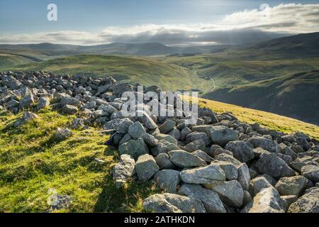 The view from Brough Law, looking down the Breamish Valley toward Hartside and Linhope in the Northumberland National Park, England Stock Photo