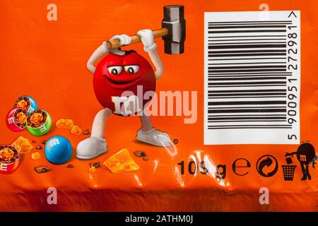 Bar code barcode and detail on packet of limited edition crunchy caramel M&Ms Stock Photo