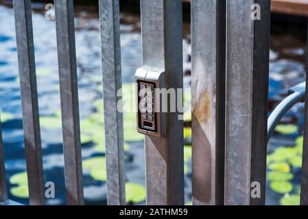 Closed server cabinets with an electronic sensor on the door. Stock Photo