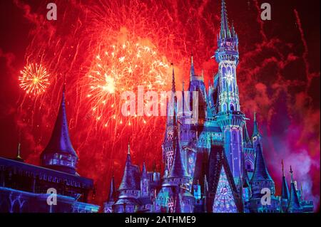 Orlando, USA - january 19, 2020: Bright disney castle at firework party at night Stock Photo
