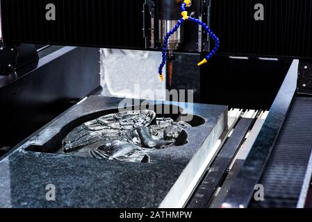 Molding made with 3D printing inserted into an injection molding machine to realize small series of plastic products Stock Photo