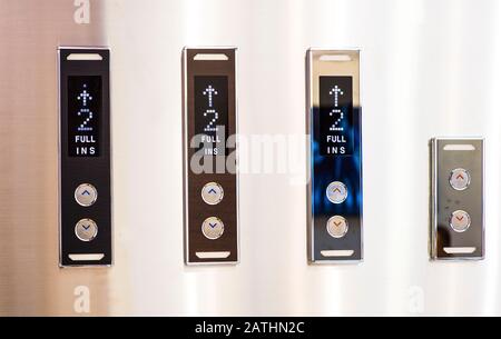 Different buttons in modern metal elevator Stock Photo