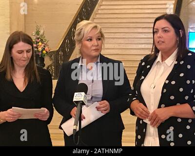 Communities minister Deirdre Hargey (right), alongside Deputy First Minister Michelle O'Neill (centre) and Sinn Fein MLA Caoimhe Archibald (left) in Stormont Buildings, Belfast. Hargey announced plans for the extension of welfare mitigations to the bedroom tax in Northern Ireland. Stock Photo