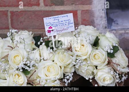 Flowers outside St John the Evangelist Church, Copthorne, for the funeral of Amy Appleton. The 32-year-old teacher was killed on December 22 2019, along with Sandy Seagrave, 76, following an incident in Crawley Down, West Sussex. Stock Photo