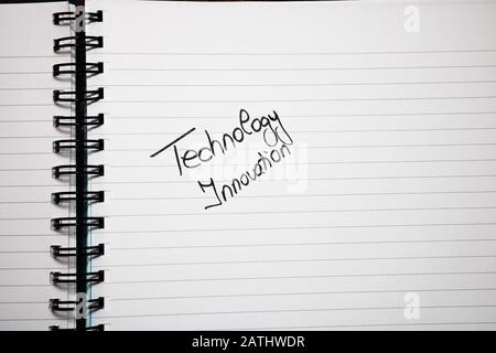 Technology innovation handwriting  text on paper, on office agenda. Copy space. Stock Photo