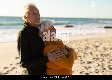 Old couple in love at the beach Stock Photo
