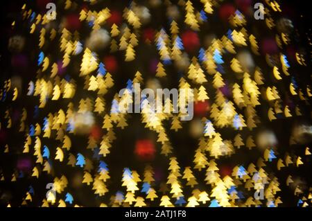 Christmas tree bokeh lights. Abstract christmas background Stock Photo