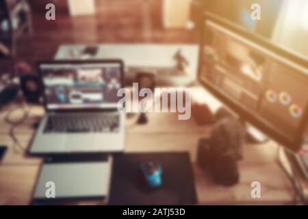 The desk of freelancers and equipment with laptop computer pen mouse and camera is for good content of her. Stock Photo