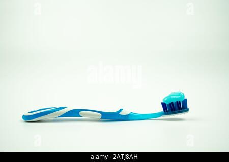 Toothbrush with toothpaste isolated on white background Stock Photo - Alamy