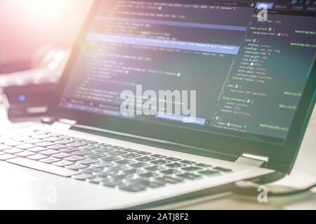 Developing programming and coding technologies. Website design. Programmer working in a software develop company office. Stock Photo