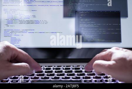 Developing programming and coding technologies. Website design. Programmer working in a software develop company office. Stock Photo