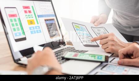 Designers drawing website ux app development. User experience concept. Stock Photo