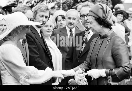 A relaxed smile from Queen Elizabeth II as she chats to guests at a garden party for 2,500 people at Hillsborough Castle during her first day of her two-day Silver Jubilee visit to Ulster. Stock Photo