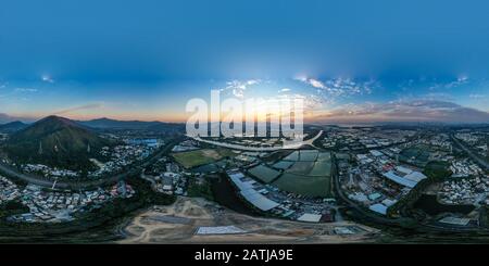 360 degree panoramic view of Aerial View of rural green fields in Hong Kong border at sunset