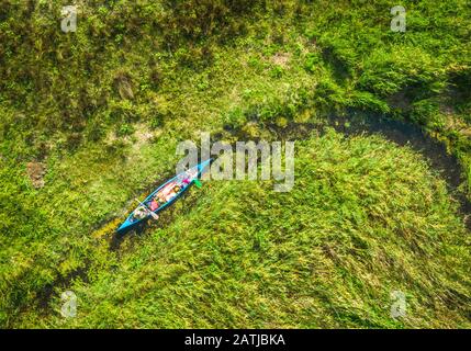 Kayak in a narrow meander of the delta Stock Photo