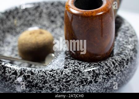 Macro picture red-brown pipe on an ashtray Stock Photo