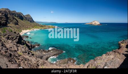 Panorama across the East coastline of Oahu over Makapu'u beach with Rabbit and Kaohikaipu islands Stock Photo