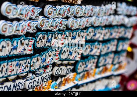 Rows of fridge magnet souvenirs from Gdansk displayed on stillage Stock Photo