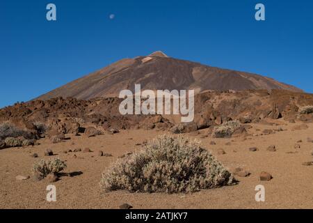 Martian landscape on the eastern slopes of Montana Blanca Mirador las Minas de San Jose with Teide mount at background. Teide National park, Tenerife, Stock Photo