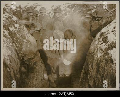 The western front. How Tommy is fed Description: Tommies eating in a ...