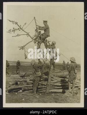 At the front Description: The emergency telephone station just behind the firing lines Annotation: On the front lines. British soldiers set up an emergency telephone station just behind the lines Date: September 1916 Keywords: communication, first world war, fronts, soldiers Stock Photo