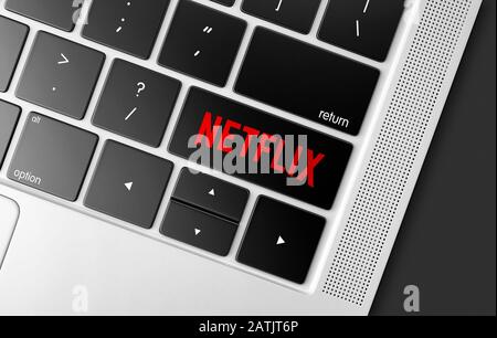 Dedicated Netflix key on a black computer keyboard, concept picture of global communications and modern TV streaming service Stock Photo