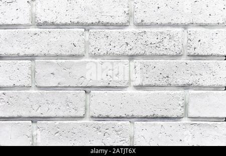 Brick wall from of white bricks. Background and texture of brickwork. Stock Photo