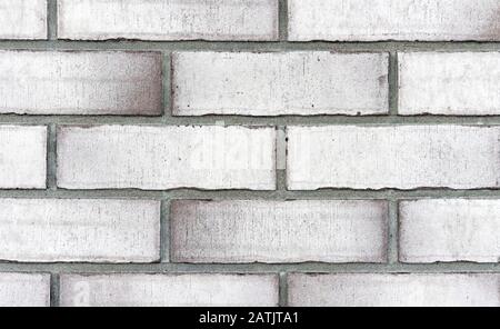 Brick wall from of white bricks. Background and texture of brickwork. Stock Photo