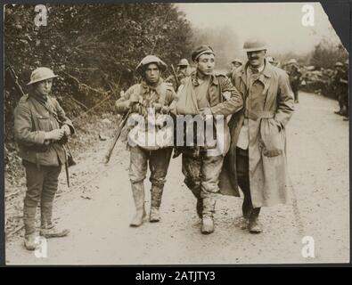 The Western Front Description: A Boche prisoner running back to get out ...