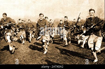 1914 The London Scottish Regiment charge with fixed bayonets during a training exercise before going into battle (WWI). The 1/14th Battalion was mobilized on the outbreak of war and was immediately sent to France France. The 2/14th Battalion went initially to France in June 1916 but   then transferred to Salonika and Palestine.  1st Battalion of the London Scottish was the first Territorial Infantry Battalion  in  1914 to be  involved in  action against  the Germans at Messines in 1914 Stock Photo