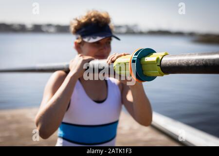 Female rowing team training on a river Stock Photo