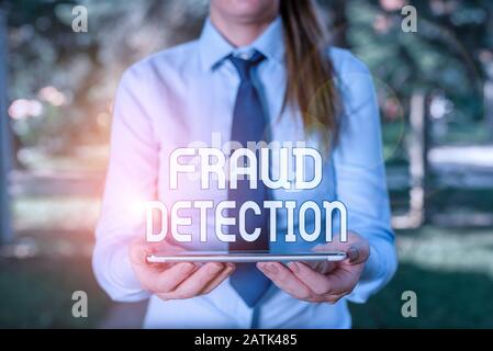 Text sign showing Fraud Detection. Business photo showcasing identification of actual or expected fraud to take place Business woman in shirt with a t Stock Photo