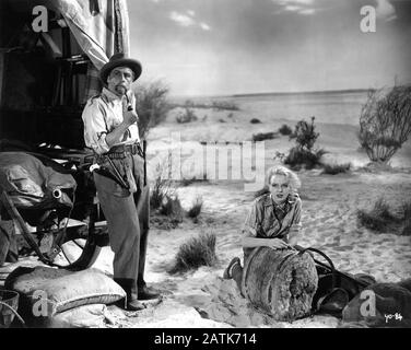 CEDRIC HARDWICKE as Allan Quartermain and ANNA LEE in KING SOLOMON'S MINES 1937 director ROBERT STEVENSON novel H. Rider Haggard Gaumont British Picture Corporation / General Film Distributors (GFD) Stock Photo