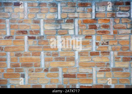 Colorful brick patterned background, limestone wall texture Stock Photo