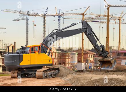 excavator at work in construction site Stock Photo