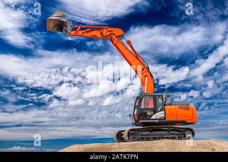 excavator at work in construction site Stock Photo