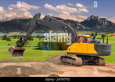 excavator at work in construction site Stock Photo