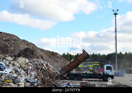 Truck, loader and a gravel separator on outcrop site Stock Photo - Alamy