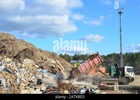 Truck, loader and a gravel separator on outcrop site Stock Photo - Alamy